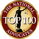 Circular gold and red badge featuring the words "The National Advocates Top 100" with an image of Lady Justice holding scales in the center, signifying Our Attorneys NYC among the nation’s distinguished legal professionals.